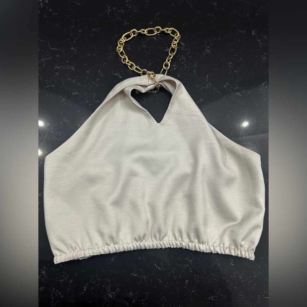 109. Meshki Cream Top with Gold Accents.